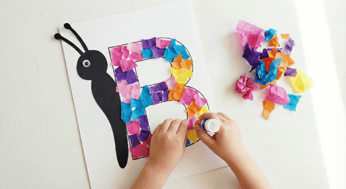Letter B butterfly craft with colorful paper wings and black body on side