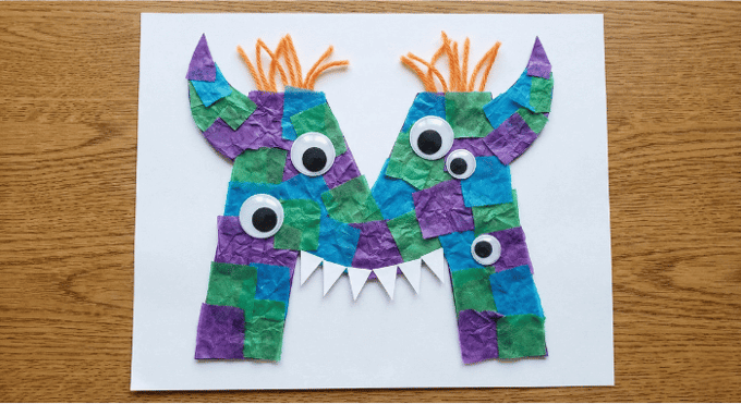 Letter M activities: monster craft using letter M shape with googly eyes and tissue paper