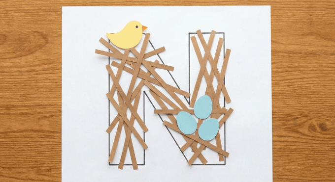 Letter N activities: nest craft using letter N shape with brown twigs and bird eggs