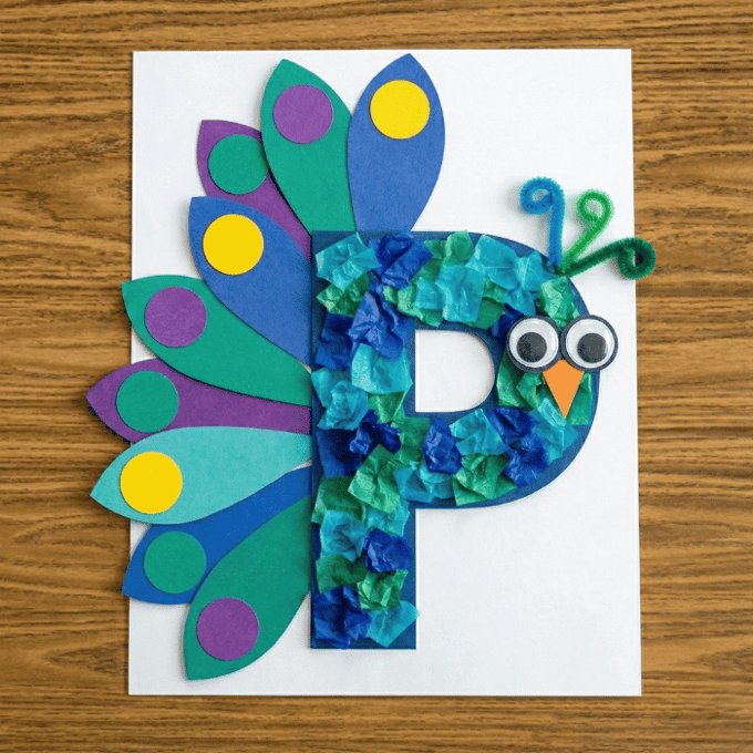 Letter P activities: peacock craft using letter P shape with colorful tail feathers collage