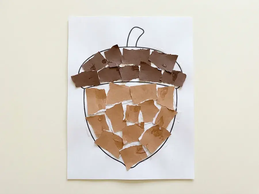 Torn paper acorn, an easy acorn and squirrel craft for preschoolers ages 3 to 5
