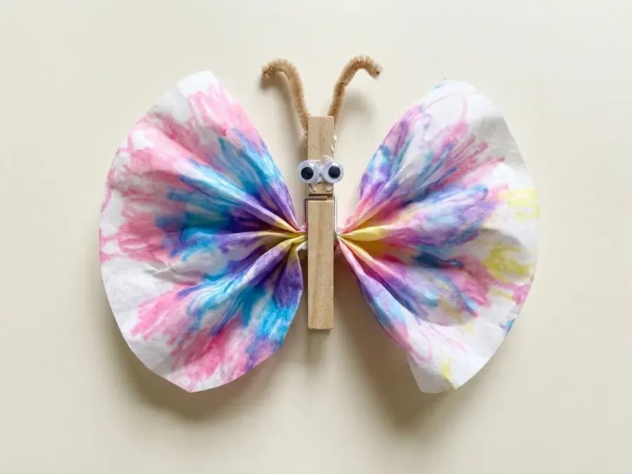 Coffee filter butterfly, an easy May craft for preschoolers ages 3 to 5