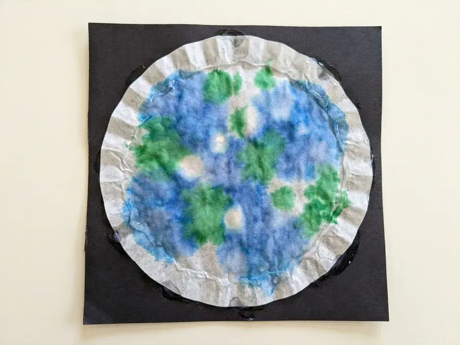 Coffee filter earth, an easy Earth Day craft for preschoolers ages 3 to 5