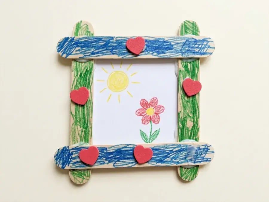 Craft stick photo frame, an easy May craft for preschoolers ages 3 to 5