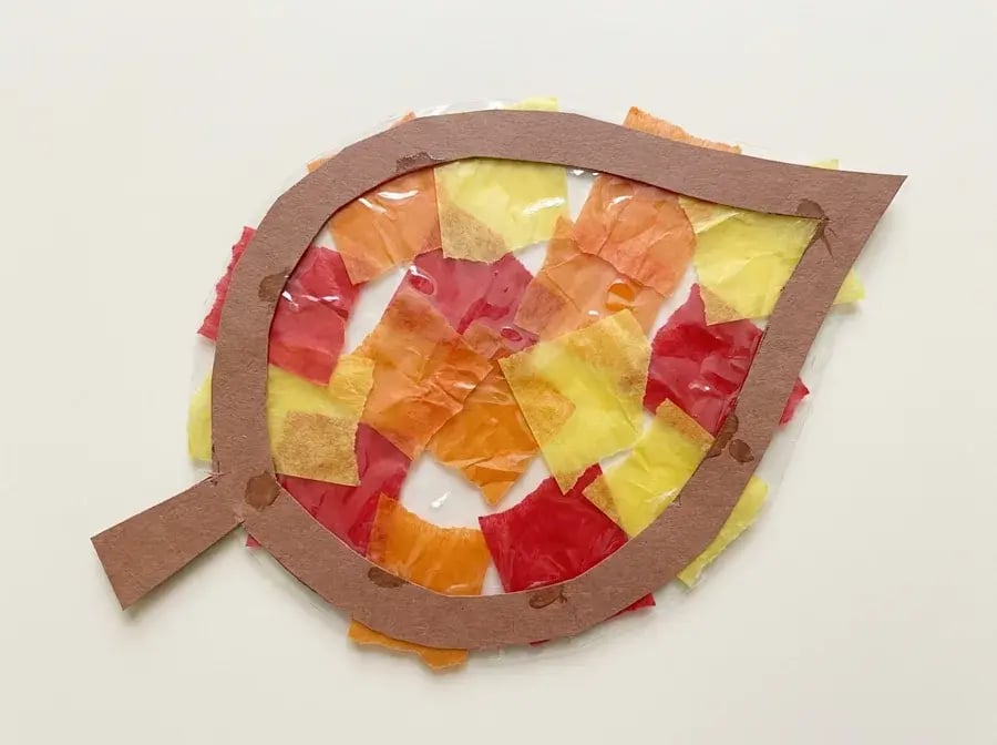 Leaf suncatcher, an easy September craft for preschoolers ages 3 to 5