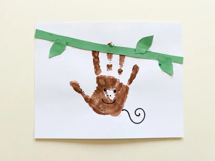 Handprint monkey, an easy zoo craft for preschoolers ages 3 to 5