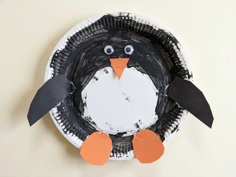 Paper plate penguin, an easy January craft for preschoolers ages 3 to 5