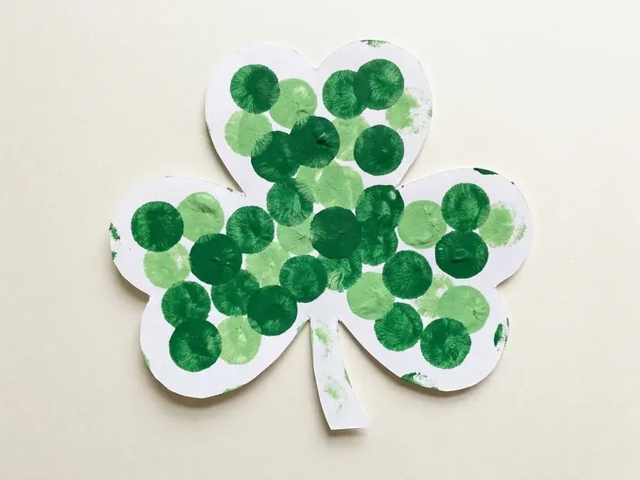 Pom pom painted shamrock, an easy March craft for preschoolers ages 3 to 5