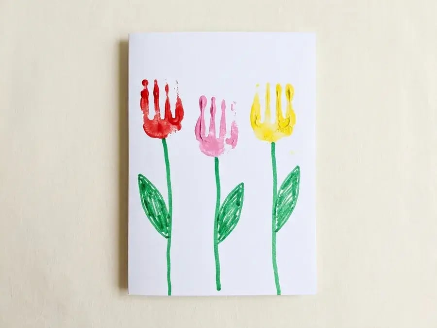 Fork stamped tulips, an easy May craft for preschoolers ages 3 to 5